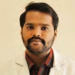 Dr. Magesh R
