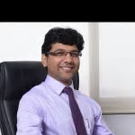 Dr. Umesh Raval